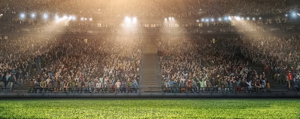 A packed crowd at a football stadium